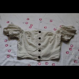 off the should button up.